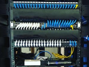 Data and voice cables installed into a data rack